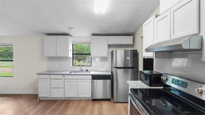 Interior, Kitchen, Recessed Lighting, Stainless Steel Appliances, Wood Texture Flooring