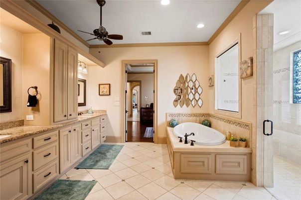 Bathroom, Dual Sink Vanities, Glass Shower, Interior, Recessed Lighting, Wood Texture Flooring