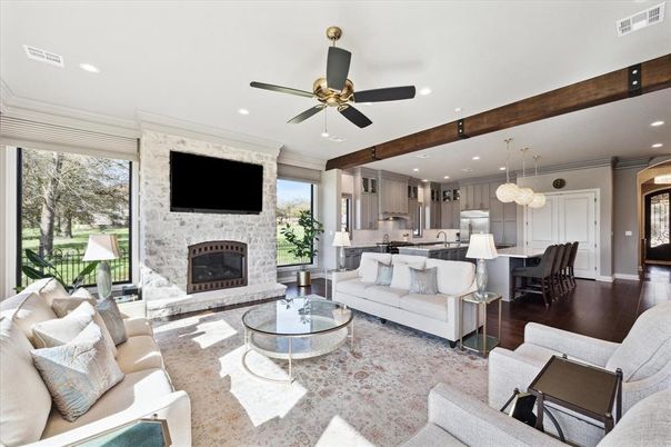 Dining room, Fireplace, Interior, Kitchen, Living room, Pendant Lights, Recessed Lighting, Stainless Steel Appliances, Stone Walls, Wooden Beams, Wood Texture Flooring