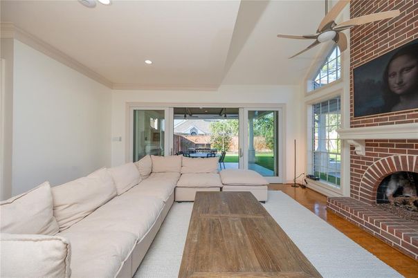 Fireplace, Interior, Living room, Recessed Lighting, Stone Walls, Wood Texture Flooring