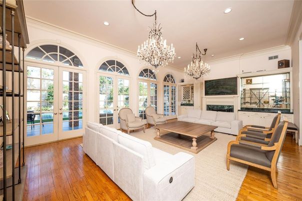 Chandelier, Fireplace, Interior, Living room, Recessed Lighting, Wood Texture Flooring