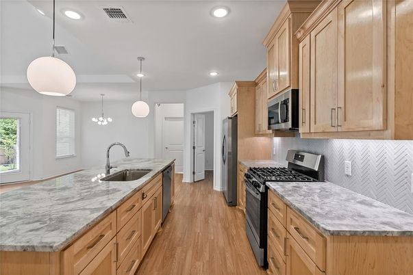 Interior, Kitchen, Pendant Lights, Recessed Lighting, Stainless Steel Appliances, Wood Texture Flooring
