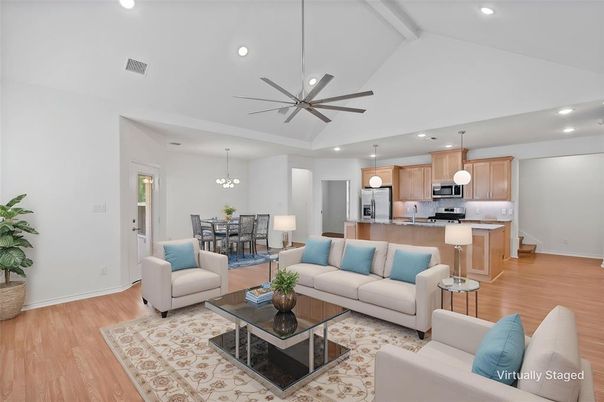 Chandelier, Dining room, Interior, Kitchen, Living room, Pendant Lights, Recessed Lighting, Stainless Steel Appliances, Wood Texture Flooring