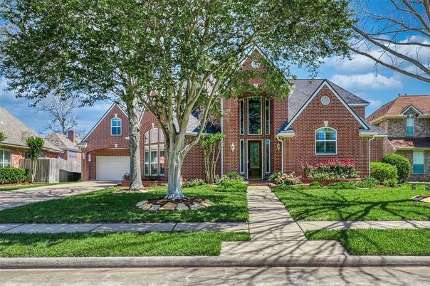 Attached, Exterior, Facade, Brick Facade, Tudor Revival