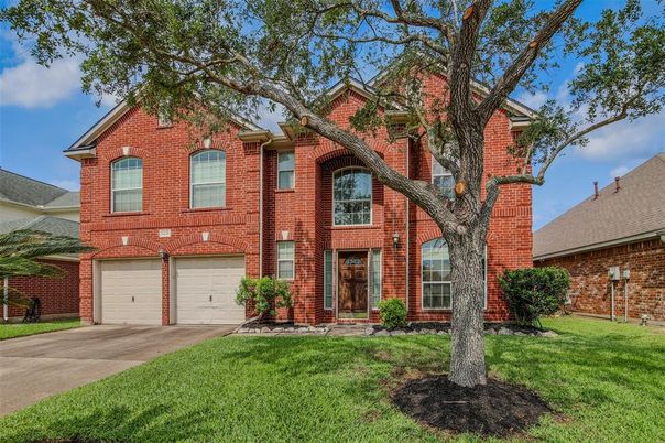 Attached, Exterior, Facade, Brick Facade, Brick Traditional