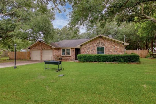 Attached, Backyard, Exterior, Facade, Brick Facade, Ranch