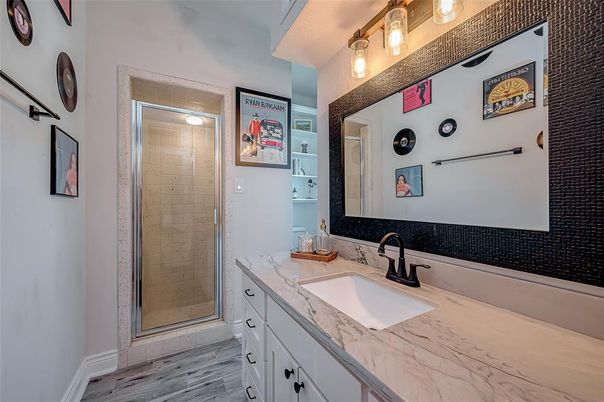 Bathroom, Dual Sink Vanities, Glass Shower, Interior, Wood Texture Flooring