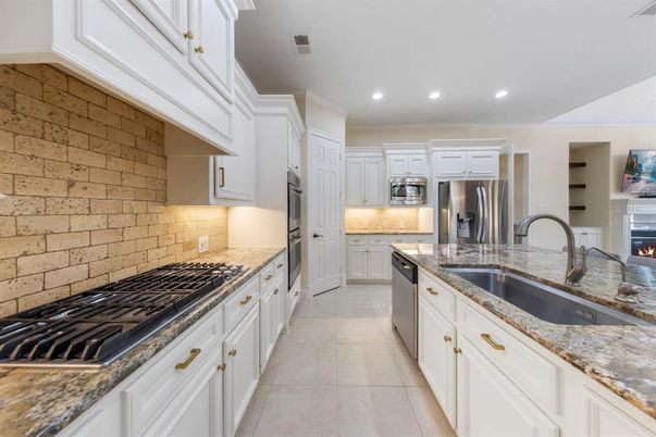 Interior, Kitchen, Recessed Lighting, Stainless Steel Appliances, Stone Walls