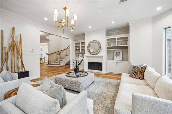 Chandelier, Fireplace, Interior, Living room, Recessed Lighting, Wood Texture Flooring