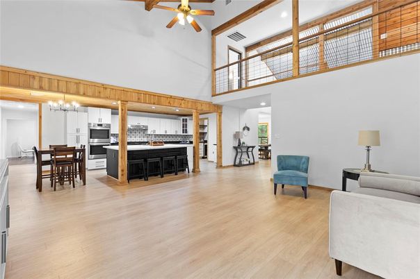 Chandelier, Dining room, Interior, Kitchen, Pendant Lights, Recessed Lighting, Stainless Steel Appliances, Wooden Beams, Wood Texture Flooring