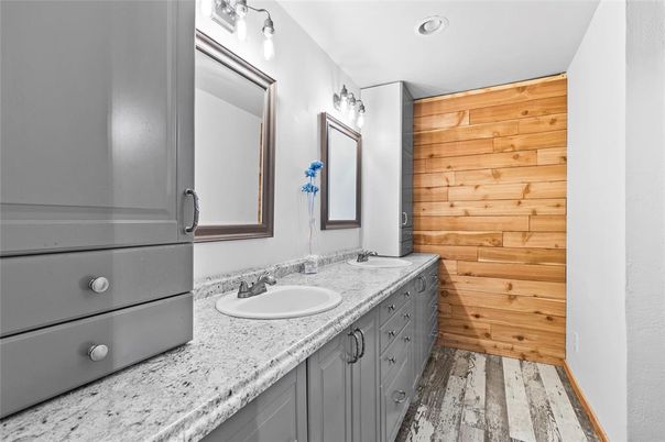 Bathroom, Dual Sink Vanities, Interior, Recessed Lighting, Wood Texture Flooring, Wooden Walls