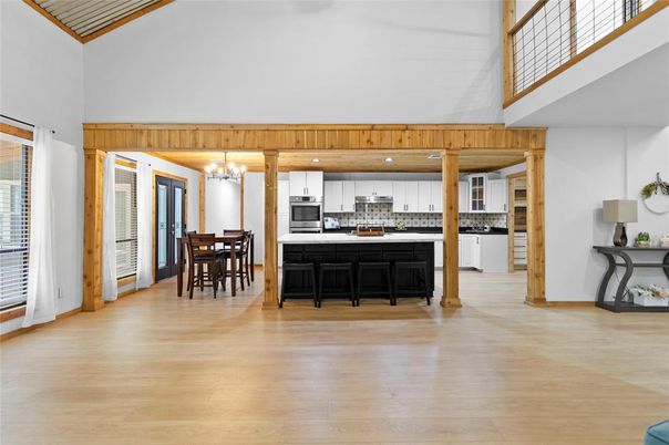Chandelier, Dining room, Interior, Kitchen, Recessed Lighting, Stainless Steel Appliances, Wood Texture Flooring