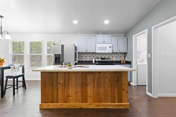 Interior, Kitchen, Pendant Lights, Recessed Lighting, Stainless Steel Appliances, Wood Texture Flooring