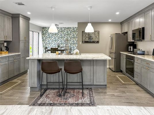 Interior, Kitchen, Pendant Lights, Recessed Lighting, Stainless Steel Appliances, Wood Texture Flooring