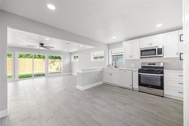 Interior, Kitchen, Recessed Lighting, Stainless Steel Appliances, Wood Texture Flooring