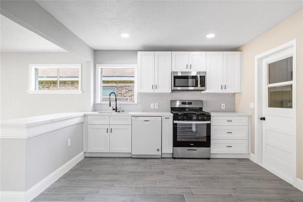 Interior, Kitchen, Recessed Lighting, Stainless Steel Appliances, Wood Texture Flooring