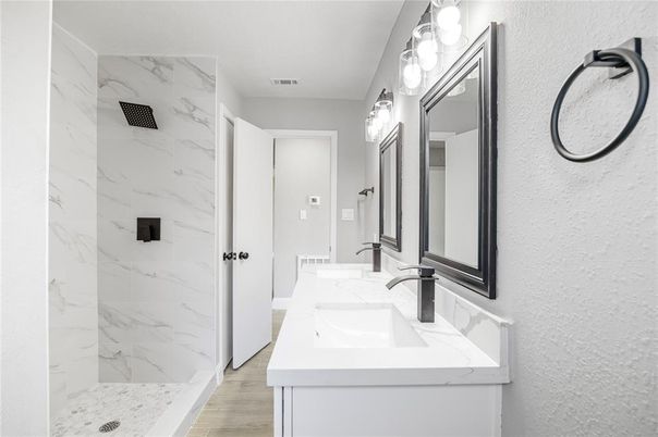 Bathroom, Dual Sink Vanities, Interior, Marble Walls, Wood Texture Flooring
