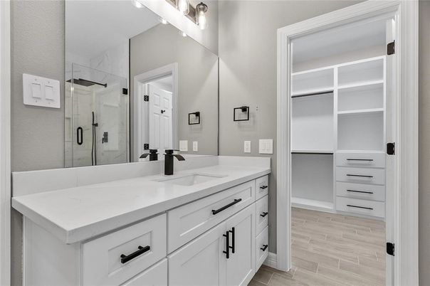 Bathroom, Dual Sink Vanities, Glass Shower, Interior, Walk-in Closets, Wood Texture Flooring