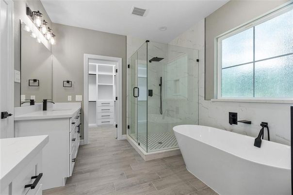 Bathroom, Dual Sink Vanities, Free Standing Baths, Glass Shower, Interior, Marble Walls, Wood Texture Flooring