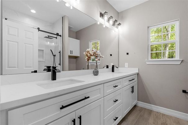 Bathroom, Dual Sink Vanities, Interior, Recessed Lighting, Wood Texture Flooring
