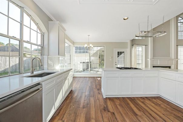Chandelier, Interior, Kitchen, Recessed Lighting, Stainless Steel Appliances, Wood Texture Flooring