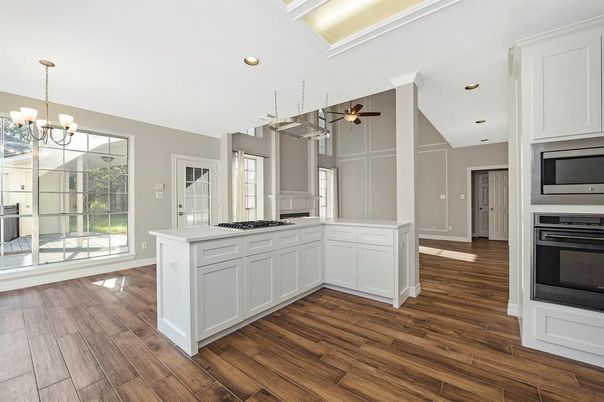 Chandelier, Interior, Kitchen, Recessed Lighting, Stainless Steel Appliances, Wood Texture Flooring