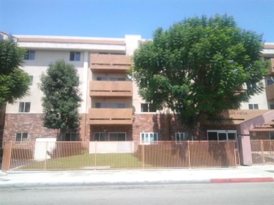 Exterior, Facade, Brick Facade, Condo Building