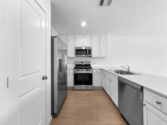 Interior, Kitchen, Recessed Lighting, Stainless Steel Appliances, Wood Texture Flooring