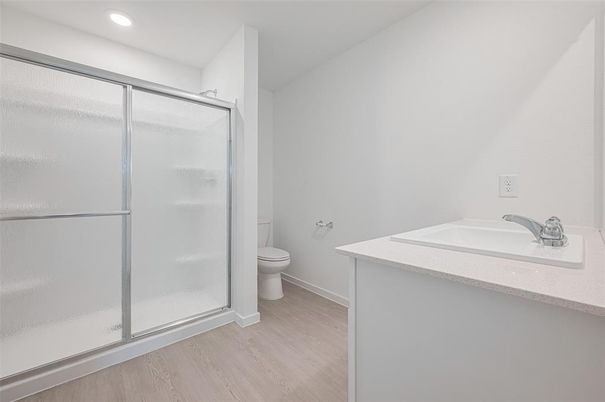 Bathroom, Glass Shower, Interior, Recessed Lighting, Wood Texture Flooring