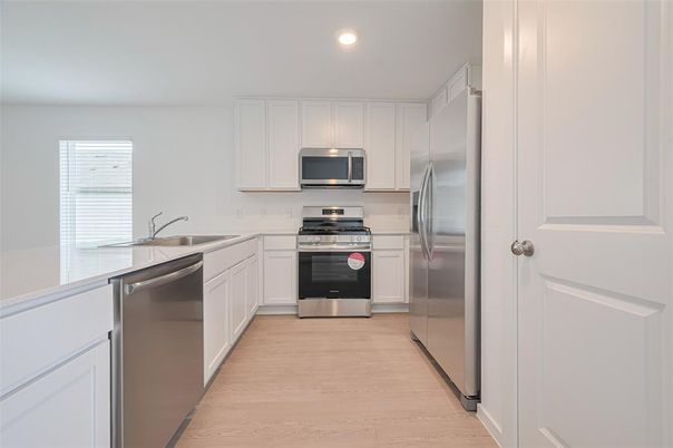 Interior, Kitchen, Recessed Lighting, Stainless Steel Appliances, Wood Texture Flooring