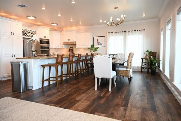 Chandelier, Dining room, Interior, Kitchen, Recessed Lighting, Stainless Steel Appliances, Wood Texture Flooring