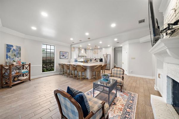 Fireplace, Interior, Kitchen, Living room, Pendant Lights, Recessed Lighting, Stainless Steel Appliances, Wood Texture Flooring