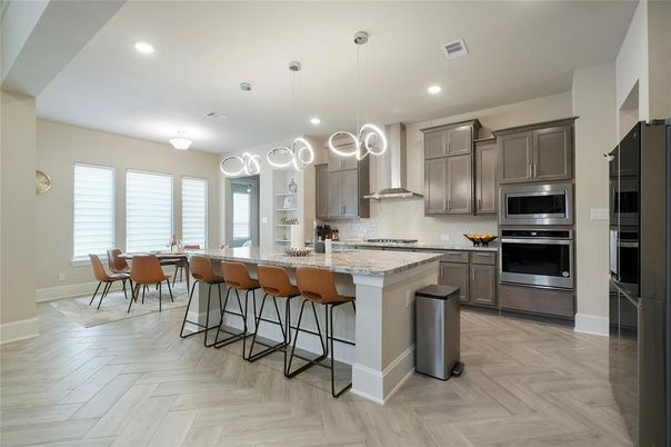 Dining room, Interior, Kitchen, Pendant Lights, Recessed Lighting, Stainless Steel Appliances, Wood Texture Flooring