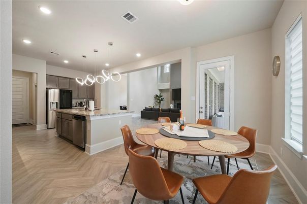 Dining room, Interior, Kitchen, Pendant Lights, Recessed Lighting, Stainless Steel Appliances, Wood Texture Flooring