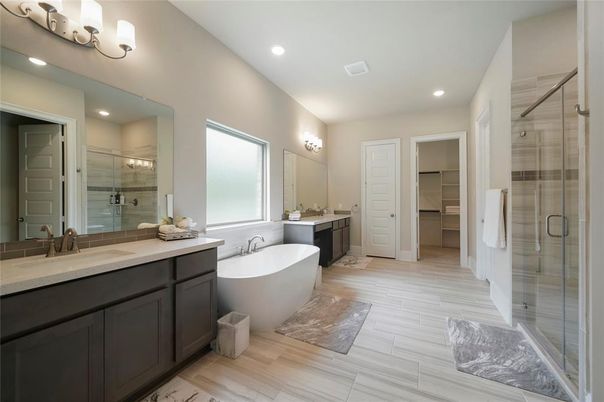 Bathroom, Dual Sink Vanities, Free Standing Baths, Glass Shower, Interior, Recessed Lighting, Wood Texture Flooring