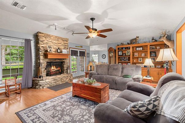 Fireplace, Interior, Living room, Pendant Lights, Stone Walls, Wood Texture Flooring