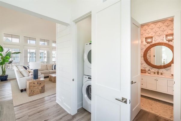 Interior, Living room, Utility Closets, Washer, Wood Texture Flooring