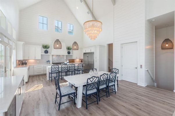 Chandelier, Dining room, Interior, Kitchen, Pendant Lights, Stainless Steel Appliances, Wood Texture Flooring