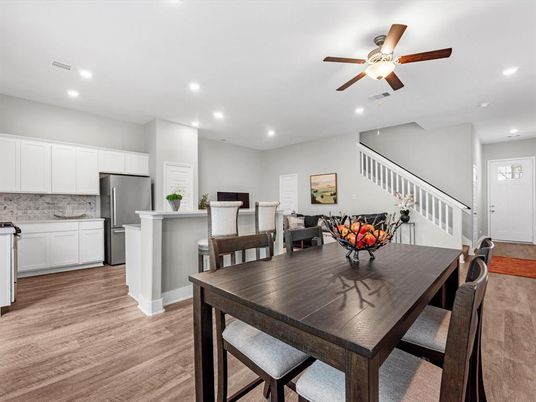 Dining room, Interior, Kitchen, Recessed Lighting, Stainless Steel Appliances, Wood Texture Flooring