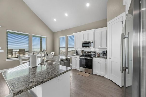 Dining room, Interior, Kitchen, Recessed Lighting, Stainless Steel Appliances, Wood Texture Flooring