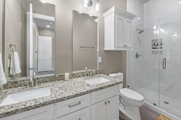 Bathroom, Dual Sink Vanities, Glass Shower, Interior, Marble Walls