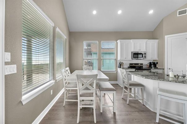 Dining room, Interior, Kitchen, Recessed Lighting, Stainless Steel Appliances, Wood Texture Flooring