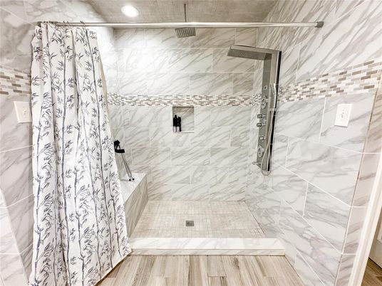 Bathroom, Glass Shower, Interior, Marble Walls, Recessed Lighting, Wood Texture Flooring