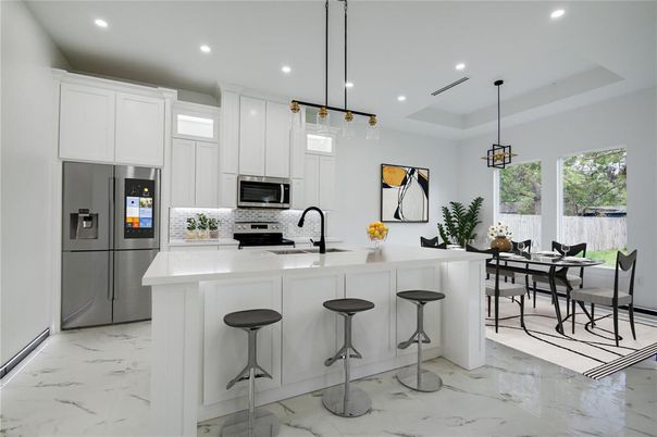 Dining room, Interior, Kitchen, Marble, Pendant Lights, Recessed Lighting, Stainless Steel Appliances