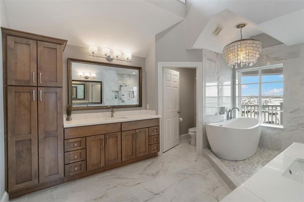 Bathroom, Chandelier, Dual Sink Vanities, Free Standing Baths, Interior, Marble, Marble Walls