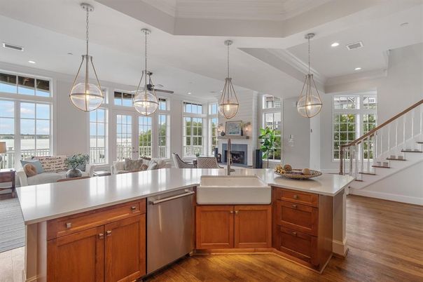 Dining room, Fireplace, Interior, Kitchen, Living room, Pendant Lights, Recessed Lighting, Stainless Steel Appliances, Wood Texture Flooring