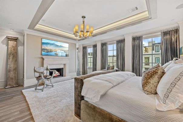 Bedroom, Chandelier, Fireplace, Interior, Recessed Lighting, Wood Texture Flooring