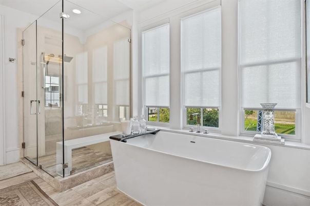 Bathroom, Free Standing Baths, Glass Shower, Interior, Recessed Lighting, Wood Texture Flooring