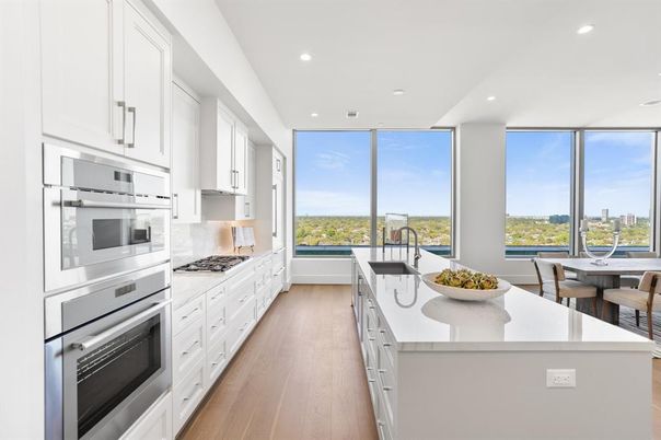 Dining room, Interior, Kitchen, Recessed Lighting, Stainless Steel Appliances, Wood Texture Flooring