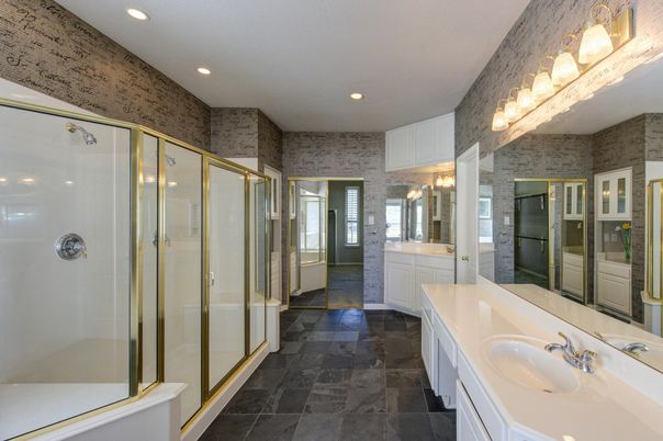 Bathroom, Dual Sink Vanities, Glass Shower, Interior, Recessed Lighting, Stone Walls